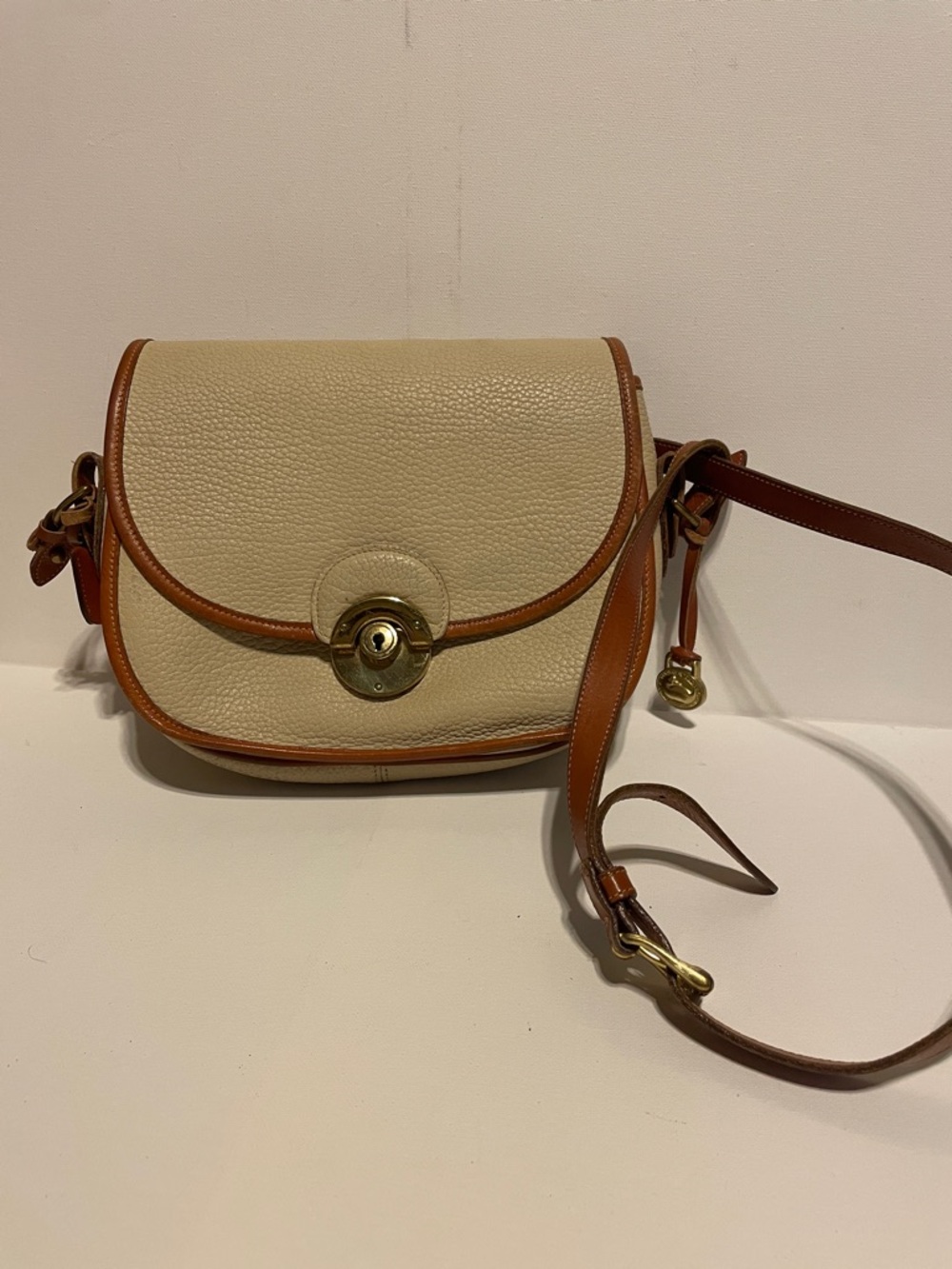 Vintage Dooney & Bourke Cream and Tan Pebbled Leather Crossbody bag